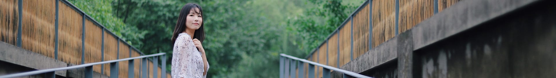 Image of young girl with forest background