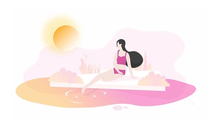 A woman sitting by the pool